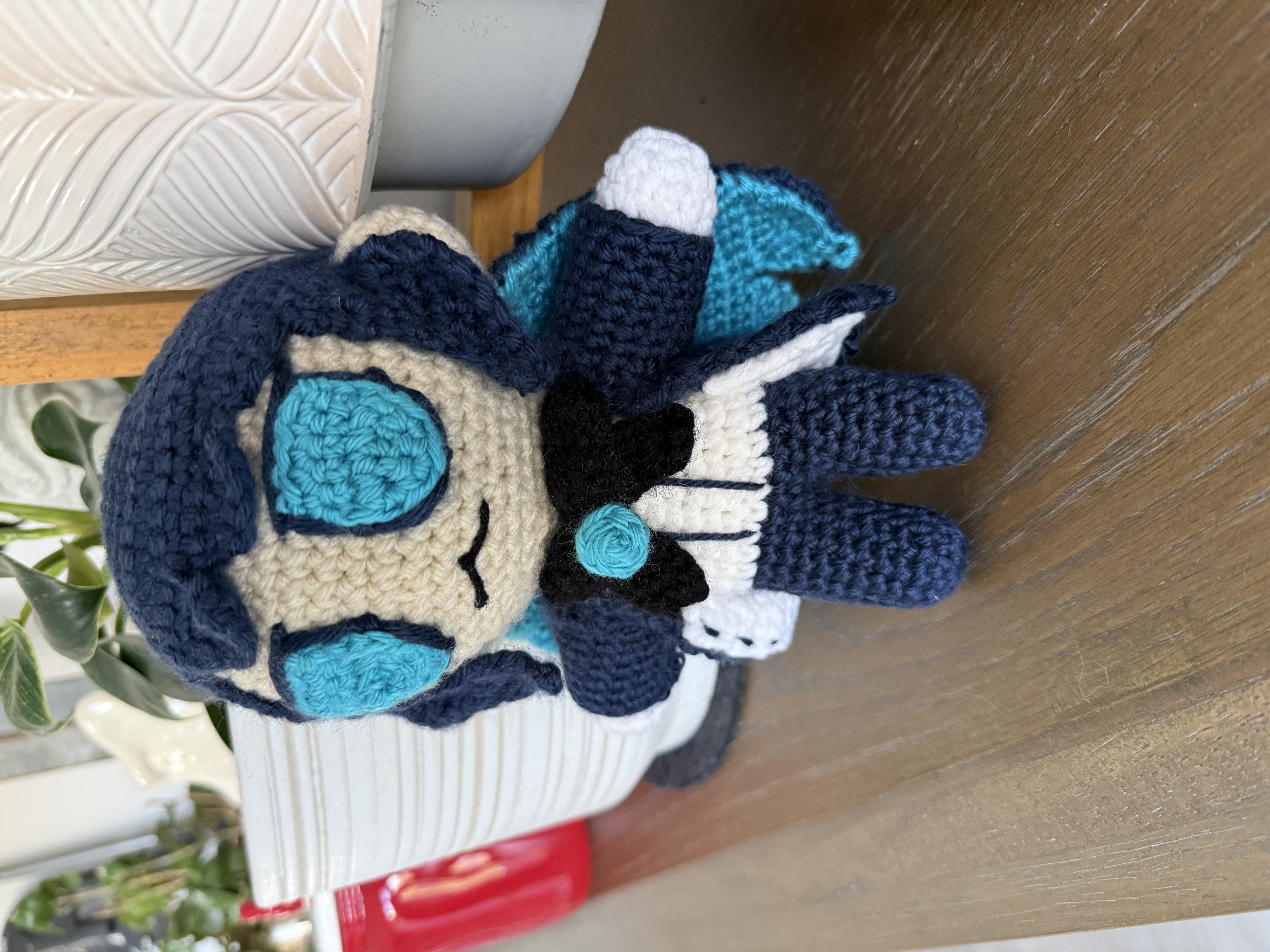 Photo of a crochet plush of Ado the singer.