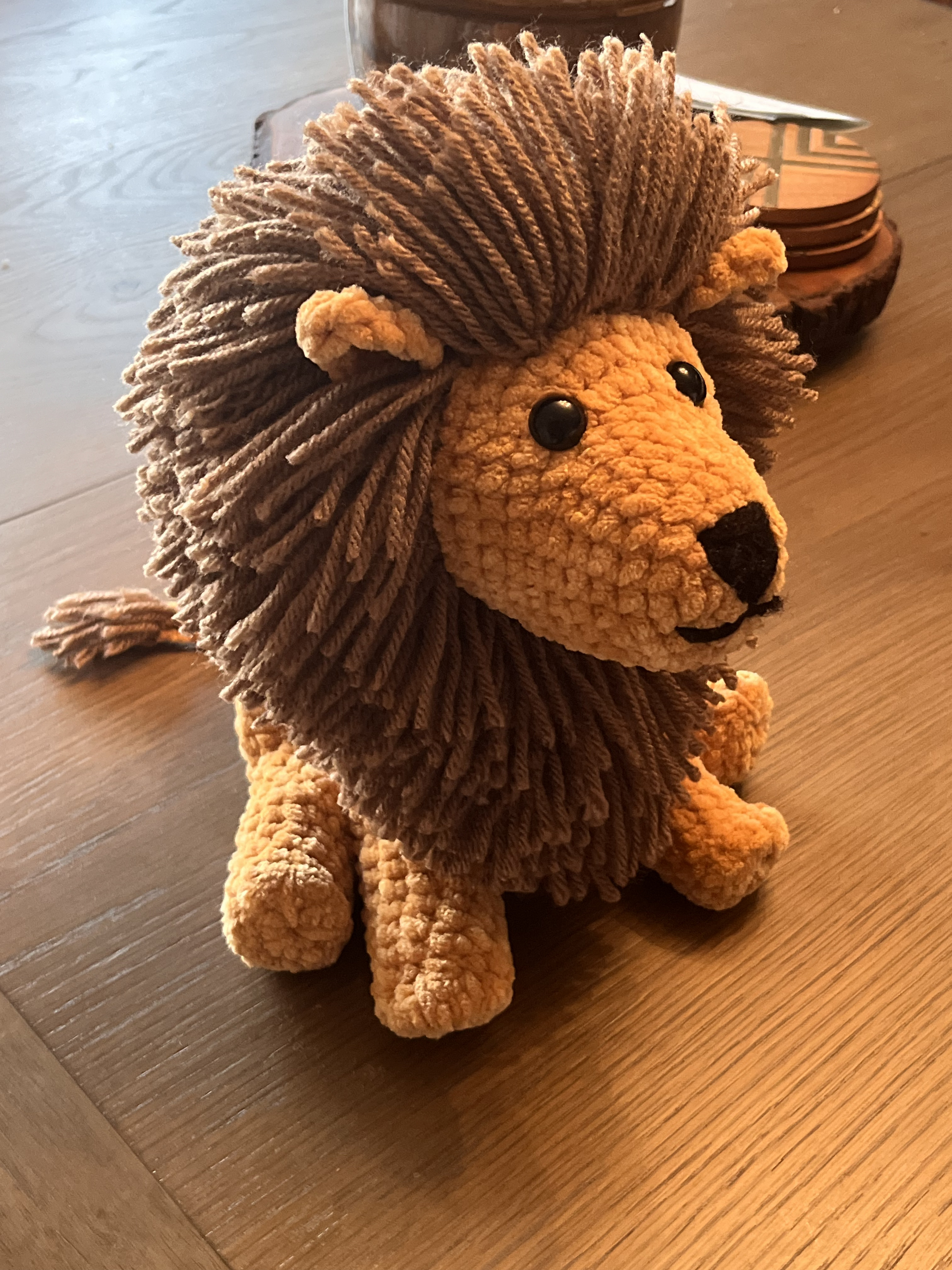 Photo of a crocheted lion.