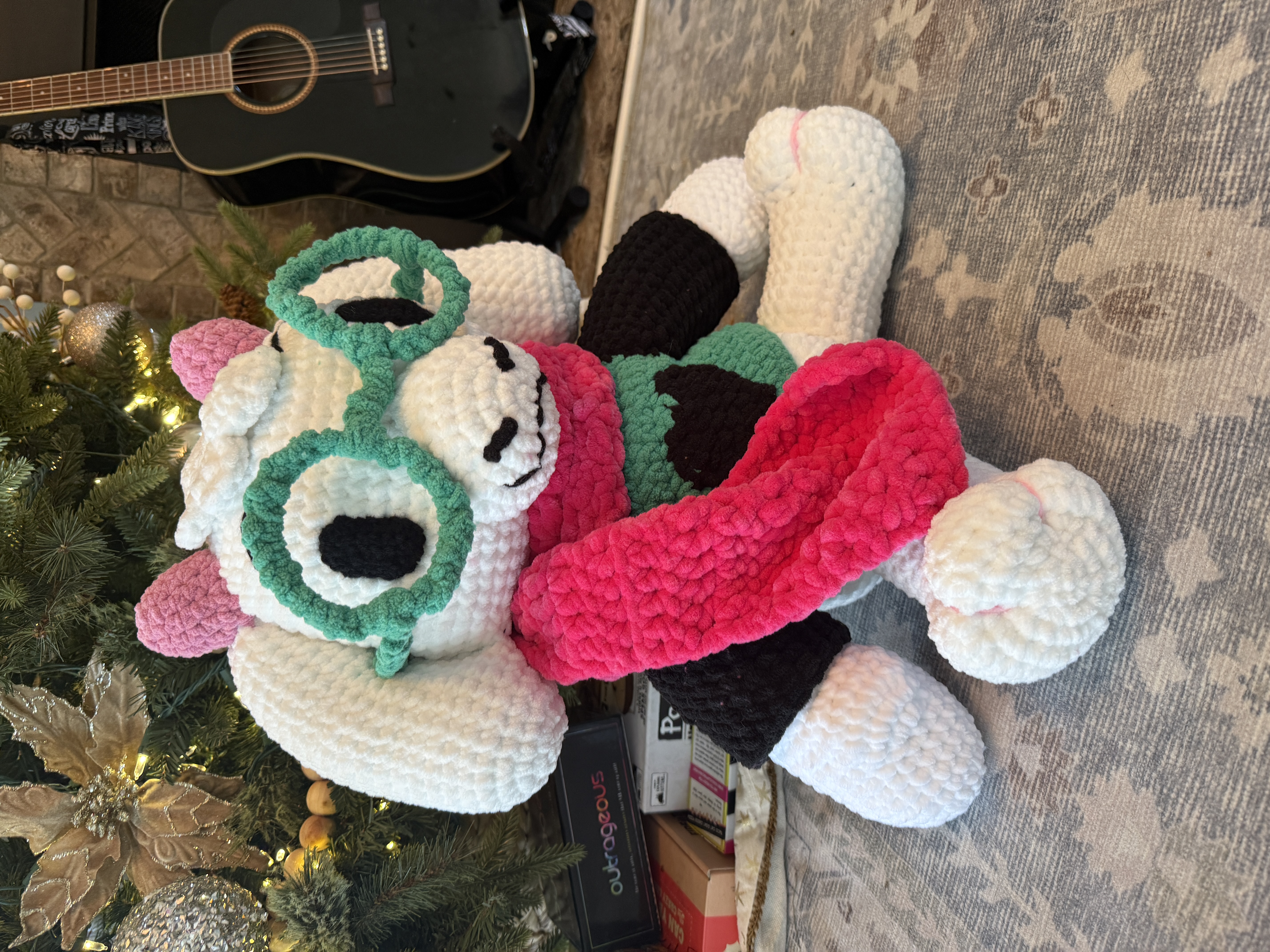 Photo of a crochet plush of the Deltarune character Ralsei.